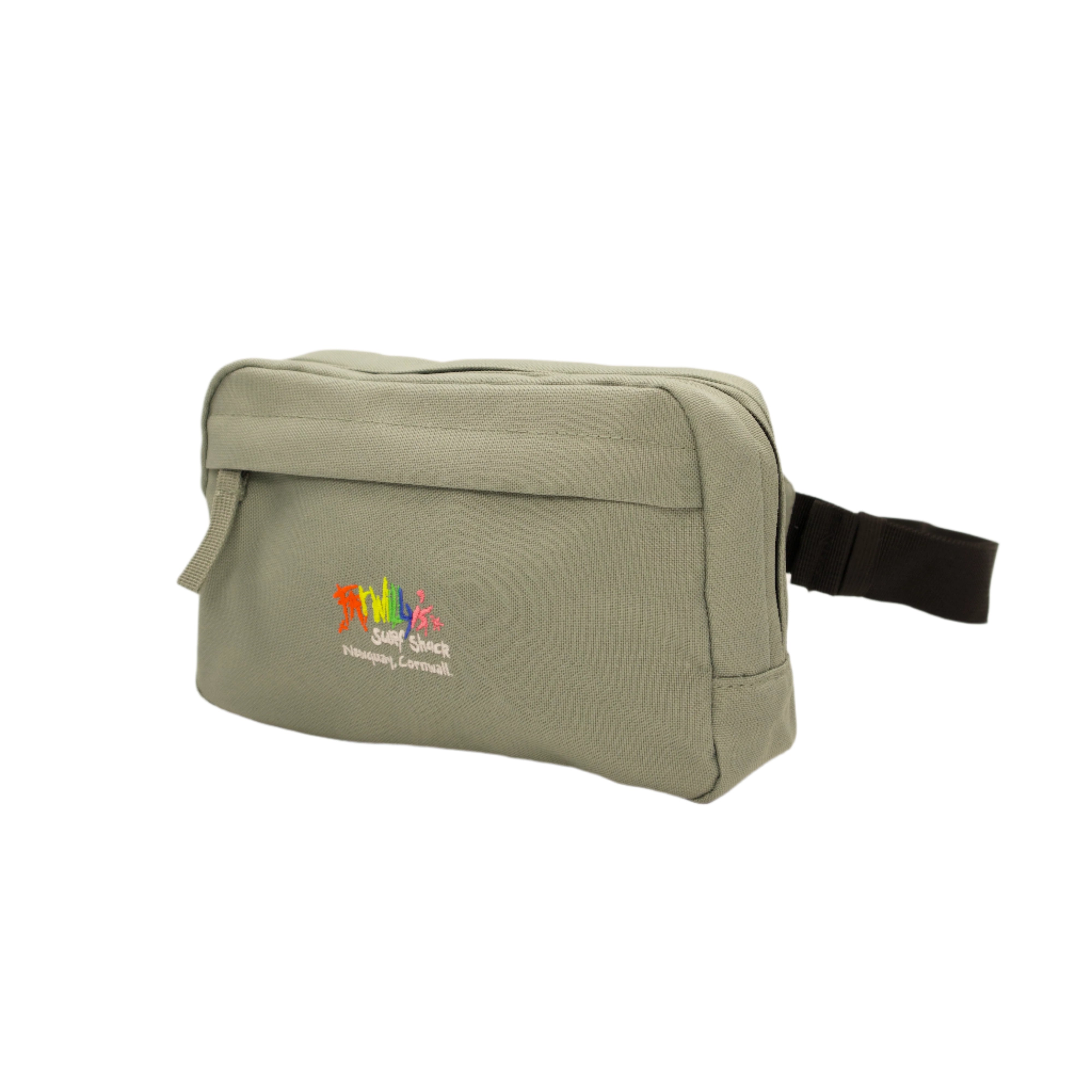 Green waist bag with a brand logo on a beige background