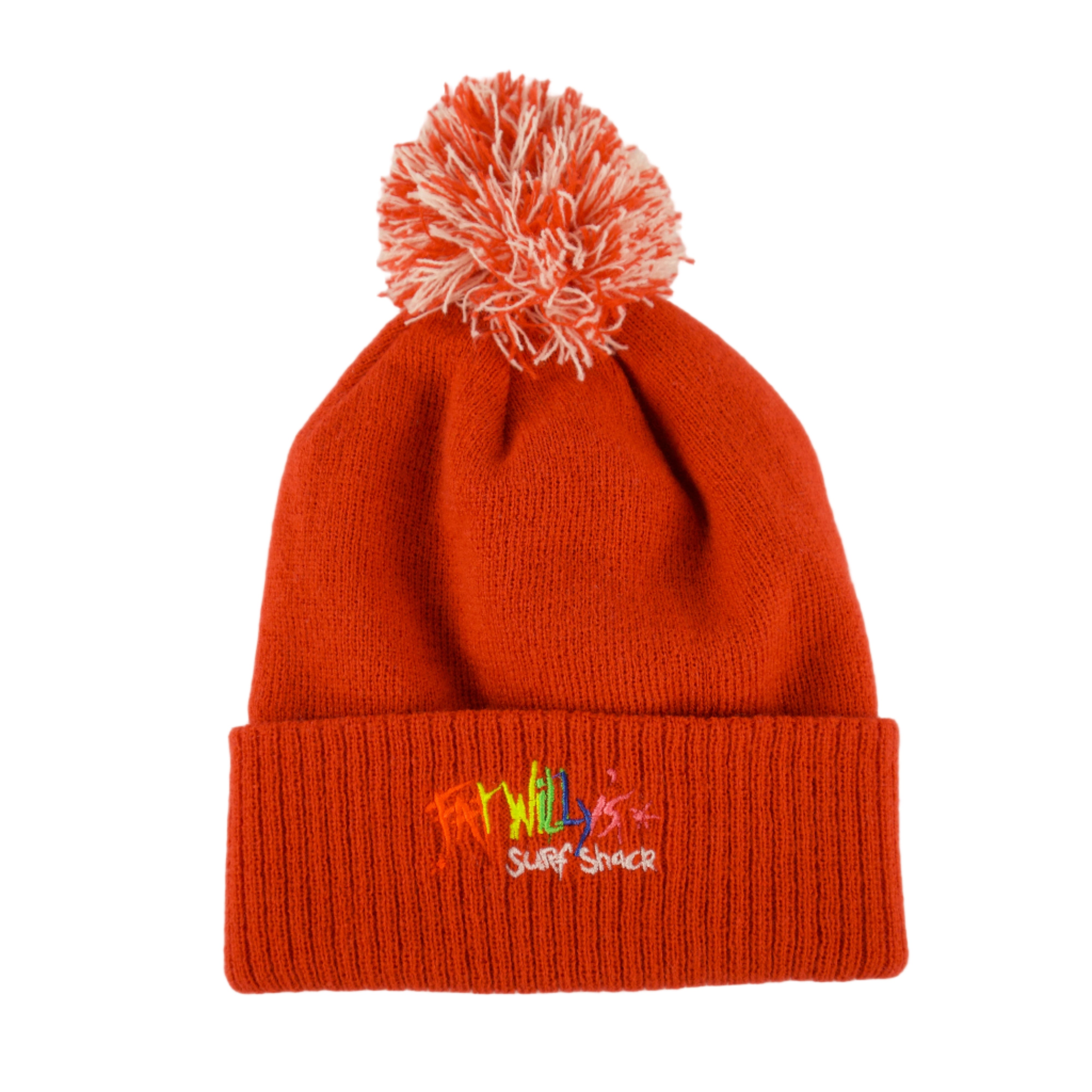 red knit beanie with pom-pom on a beige background