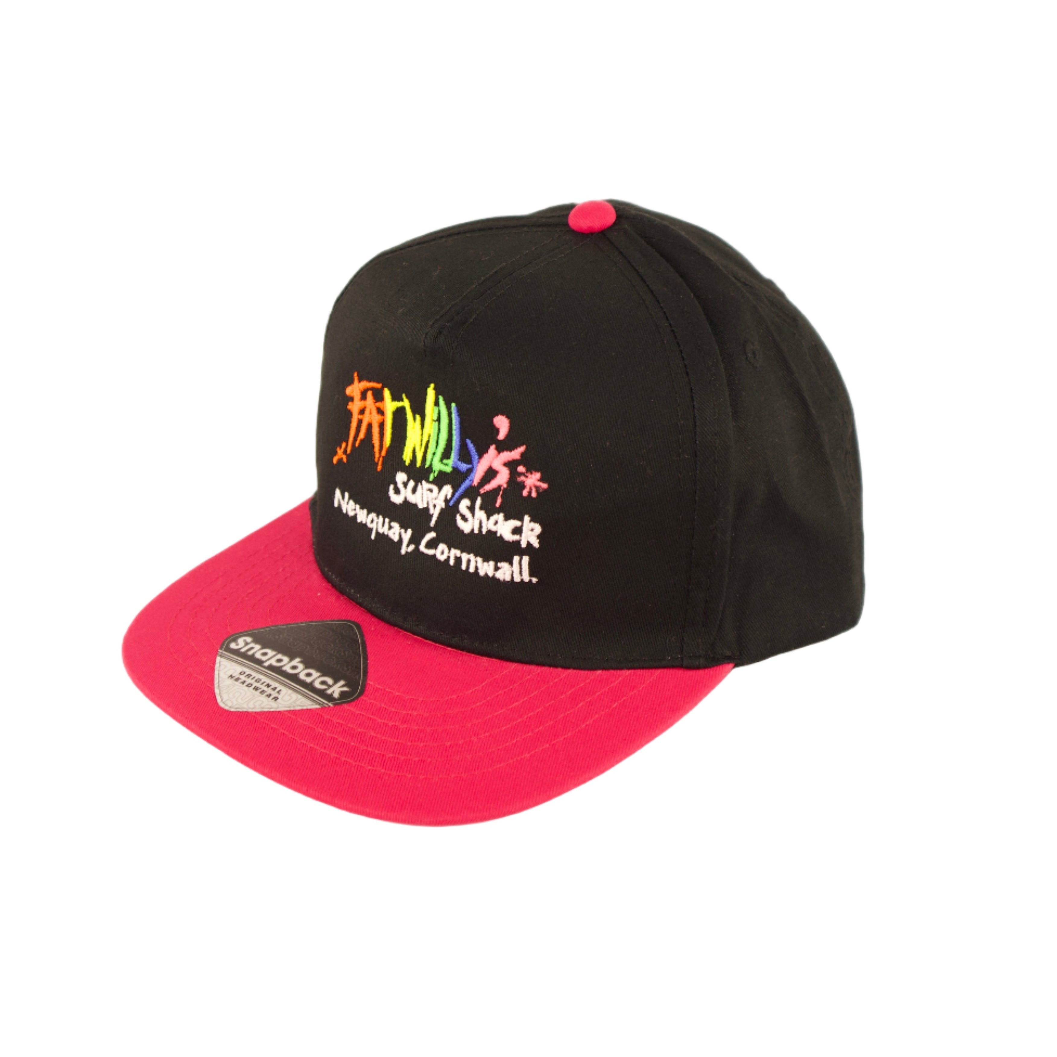 Black and pink cap with colorful text on a light beige background