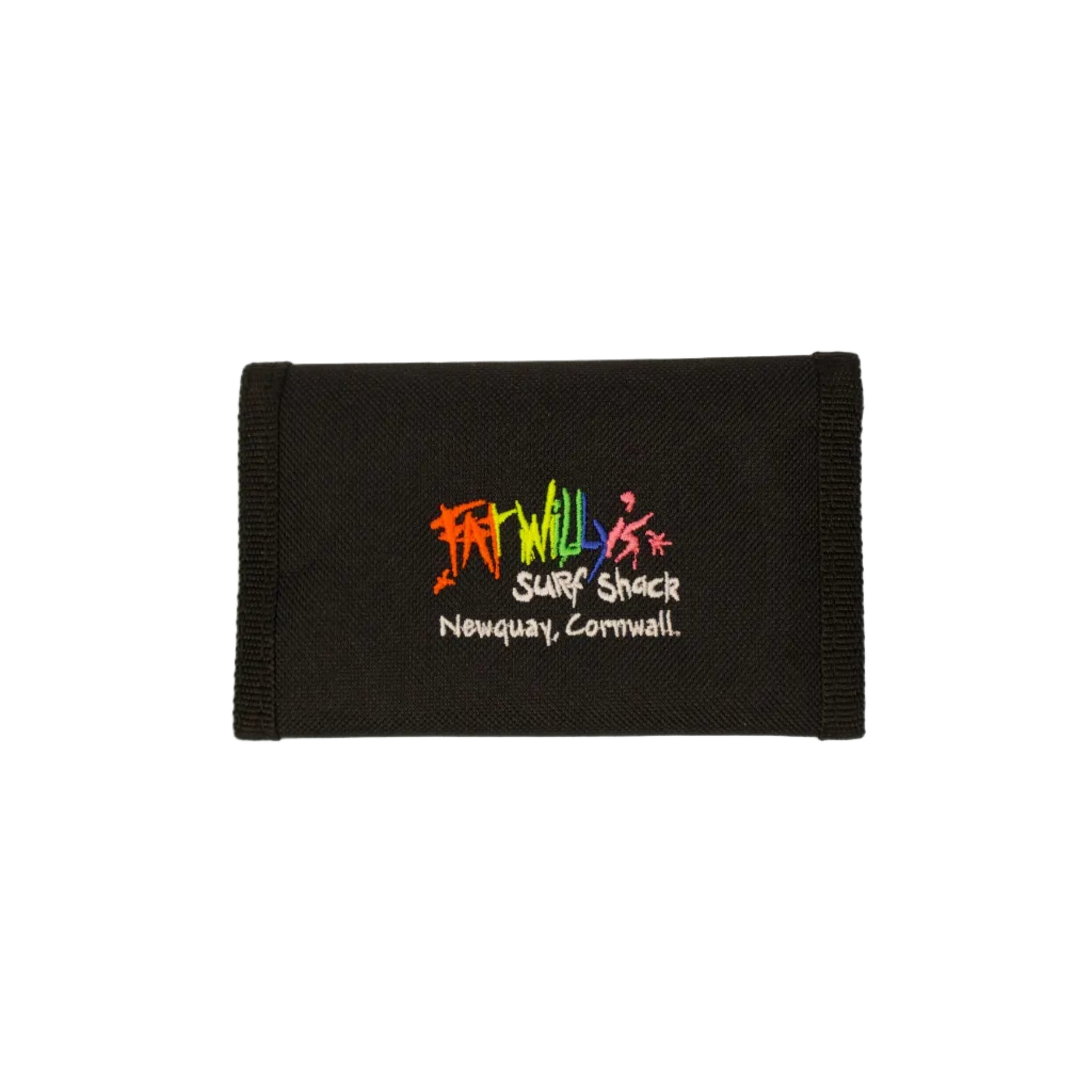 Black fabric with colorful embroidery on a beige background